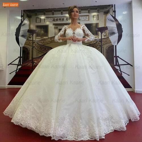 Arabic O Neck Wedding Gowns White Long Sleeves 2021 robe de mariée Backless Bridal Dresses Lace Appliques Beading hochzeitskleid