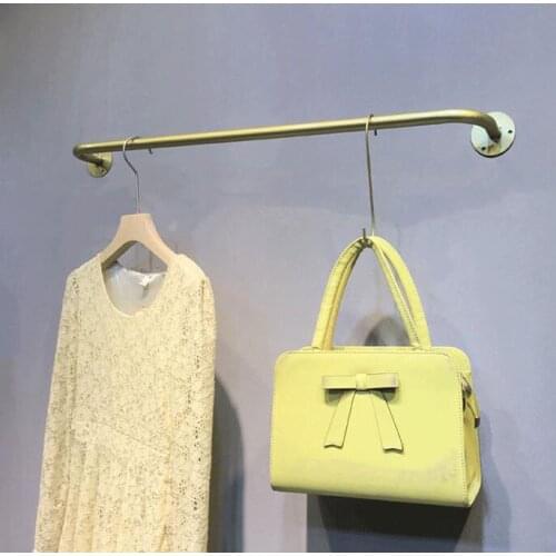 Clothes shop display rack wall hook is hanging gold iron hanging clothes rack shop