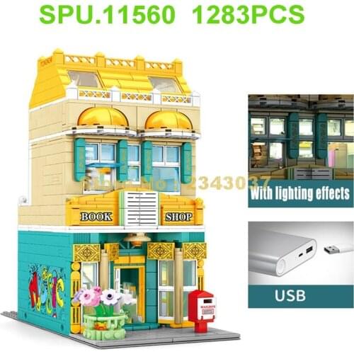 601144 1283pcs Street View Architecture Bookstore Book Shop With Light 6 Dolls Building Blocks Toy