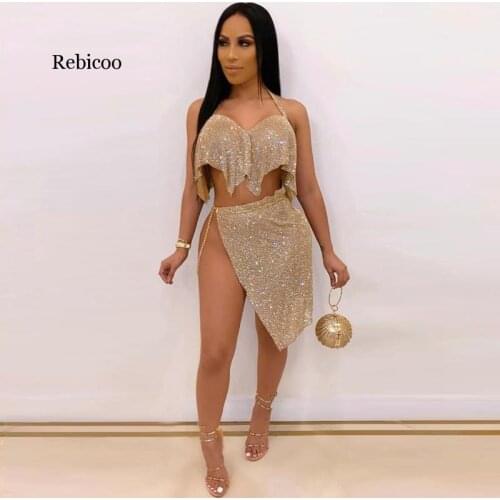 Rebicoo Shiny Two Piece Set Women Sexy Night Club Outfits Halter Crop Top Asymmetrical Skirt Suit with Chain Wholesale