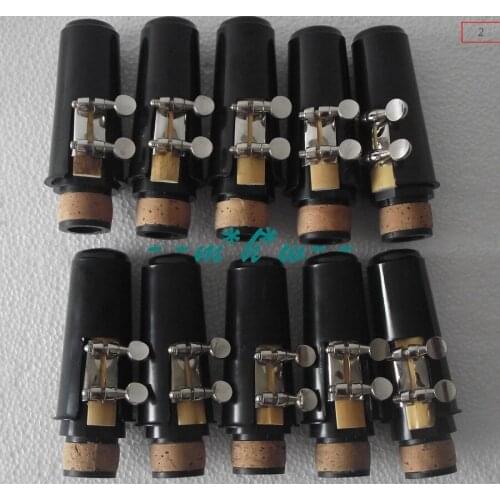 10 set Bb clarinet mouthpiece Ligature and cap reeds Good material good sound