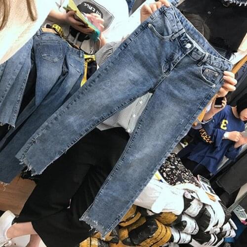 Fat MM slim slim stretch nine-point pants 200 kg large size high waist irregular split jeans womens trend