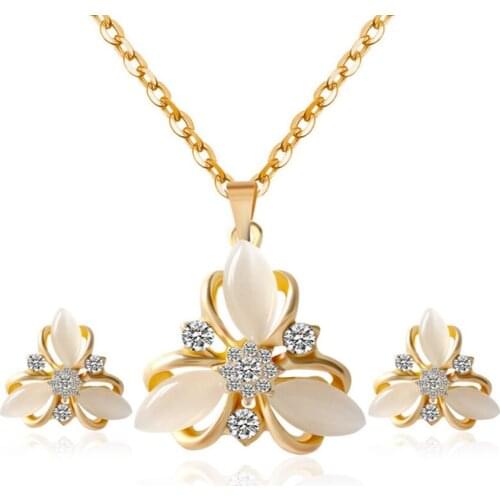 FYJS Unique Jewelry Sets Light Yellow Gold Color Cat Eye Stone Pendant Flower Necklace with Rhinestone Earrings