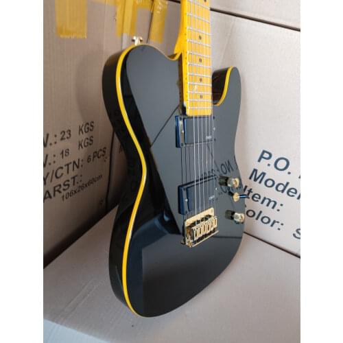 Glossy black and yellow electric guitar