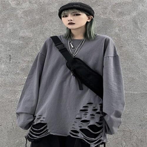 Womens undershirts Ms. new foreign style hole long-sleeved shirt loose Korean version wearing autumn clothes black T-shirt tide