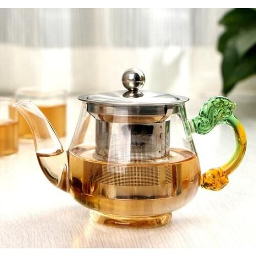 The new glass teapot is a travel tea set for a family teapot