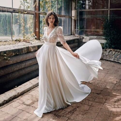 UZN Boho Open Back Lace Beading Wedding Dress A-Line V-Neck Half Sleeves Chiffon Bridal Gowns Saudi Arabic Bridal Gowns Customiz