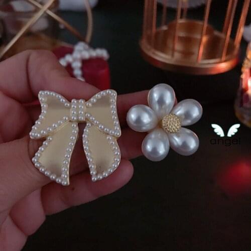 Jewelry girl is a brooch pearl flower sweet bowknot lovely delicate joker Japan and South Korea
