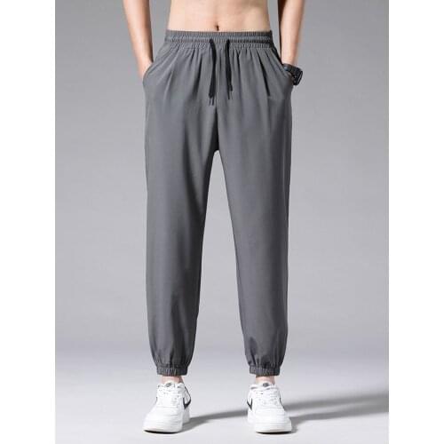 Jogger MenS Loose Sports Trousers 2021 MenS Clothing Summer Thin Fashion Polyester Pocket Casual Trousers Korean Streetwear