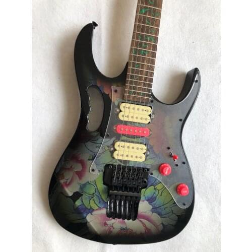 Electric guitar, with lotus on the body, supports customization