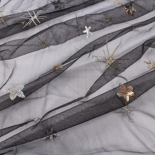Glitzy sequins starfish embroidered gold silver on mesh fabric 155cm wide by yard