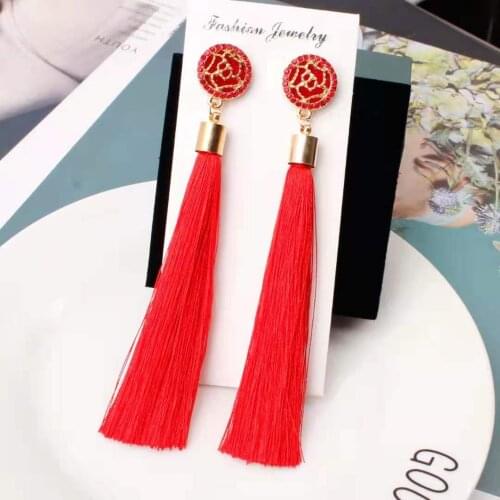 Long roses, flowers, tassels, ear studs