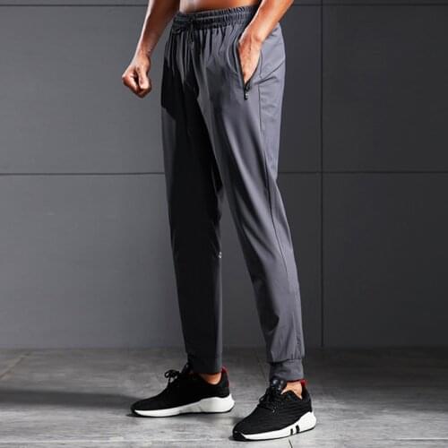 Male Sweatpants Fashion Athletic Jogging Sports Gym Tracksuit Trousers Running Sweat Sportswear Joggers Pants Men Pockets Solid