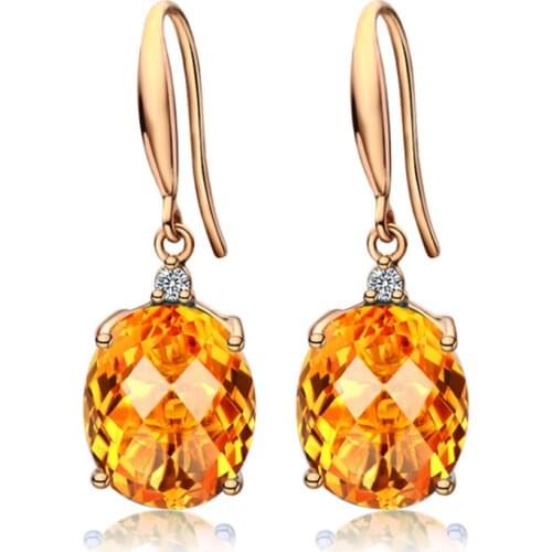FYJS Unique Rose Gold Color Oval Shape Yellow Citrines Crystal Dangle Earrings Temperament Jewelry