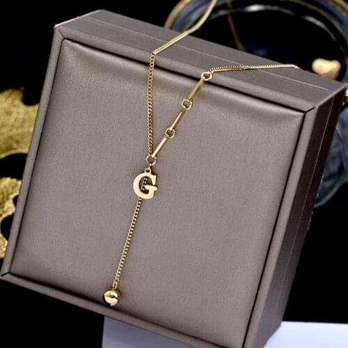 316L stainless steel Japan and Korea small crowd necklace in 2021 new female net red G letter pendant sweater necklace tide