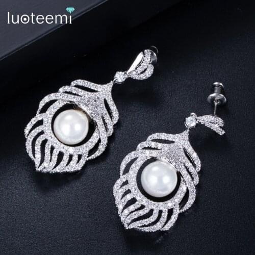 LUOTEEMI Luxury AAA Cubic Zirconia Micro Paved Imitation Pearl Feather Heavy Big Drop Earrings Bridal for Sexy Women Jewelry