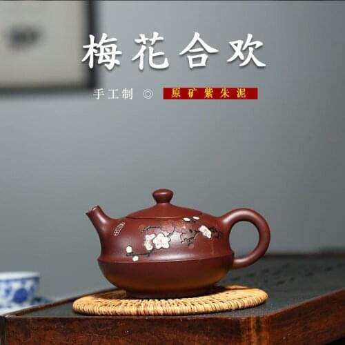 Yixing teapot by hand are recommended purple clay teapot zhu ball hole plum flower meadow tea shop wholesale agents