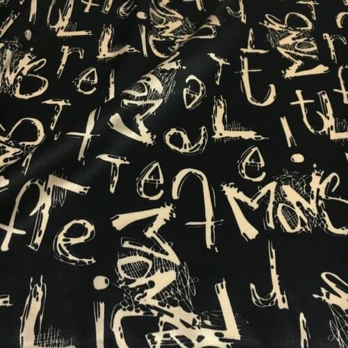 Artistic letter printing black milk tea color stretch digital printing fabric natural mulberry silk high fashion textile fabric