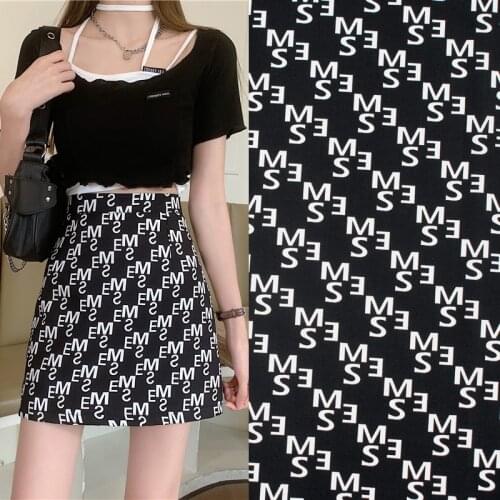 Letter pattern on black reactive dyes pure cotton fabric for dress tissus au mètre telas por metro tissu vestidos sewing tela