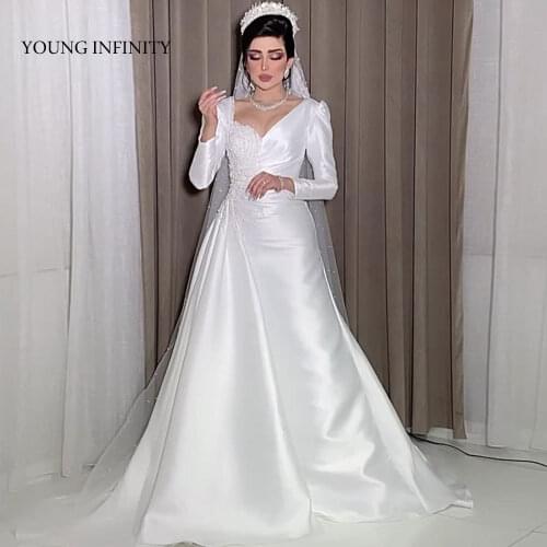 Romantic A Line Wedding Dress 2022 Pearls Bridal Gown Long Sleeves Sweep Train Matte Satin Saudi Arabia Bride Formal Wear White