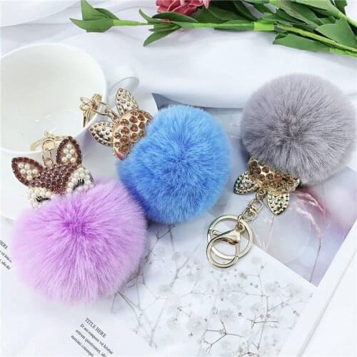 Animal head pendant pearls rhinestones womens bag New hair ball key ring
