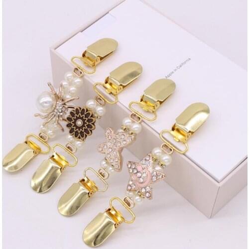 Europe and the United States popular clothing high-end pearl dress clip gold duckbill button cardigan tightening clip
