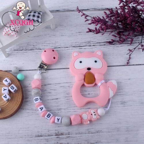 XCQGH 2Pcs/set Cute Animal Pendant Raccoon Silicone Teether and Baby Teething Pacifier Leash Strap