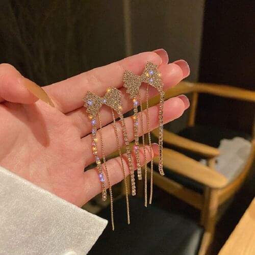 Exknl 2021 New Female Bowknot Drop Earrings Shiny Crystal Gold color Fashion Wedding Long Tassel Korean Women Earrings Jewelry