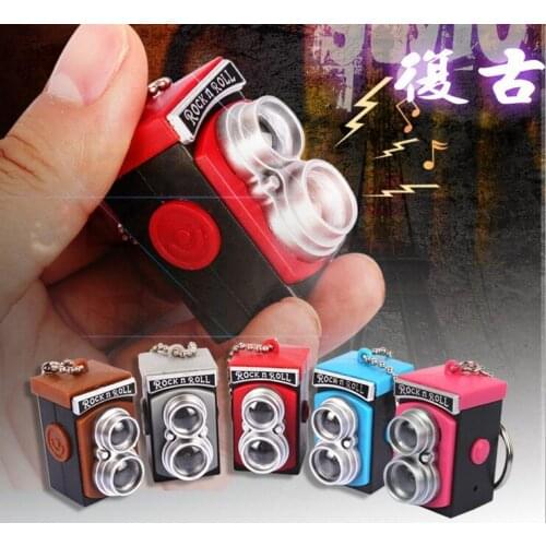 FREE SHIPPING BY DHL 200pcs/lot 2015 Plastic LED Vintage Camera Shaped Keychains with Sound Novelty Children Toy Keyrings