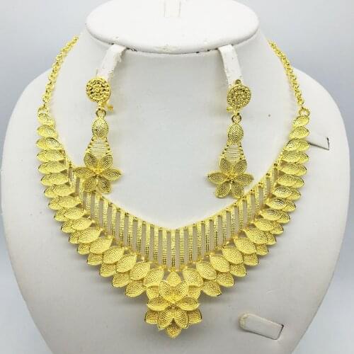 Diverse selection of stylish wedding Dubai African Jewelry collection gold necklace earrings romantic woman bride jewelry