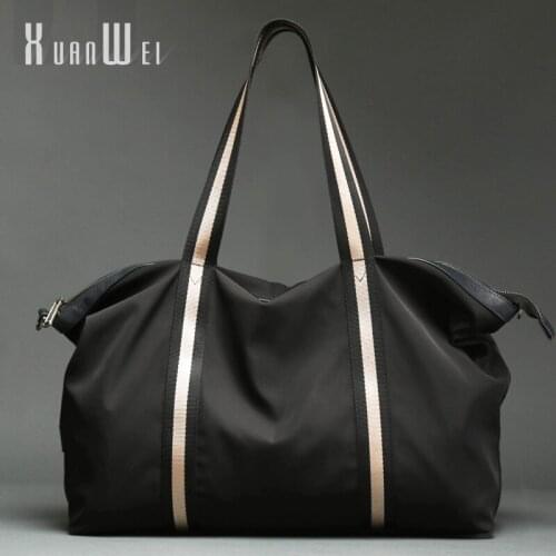 Xuanwei Leisure travel bag handbag unisex large-capacity messenger bag short trip light travel new