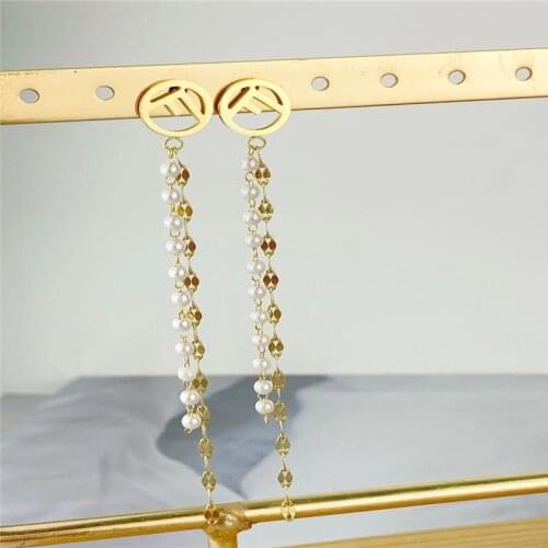 Temperament pearl earrings female fashion long flow suction metal chain earrings female European and American personality earrin