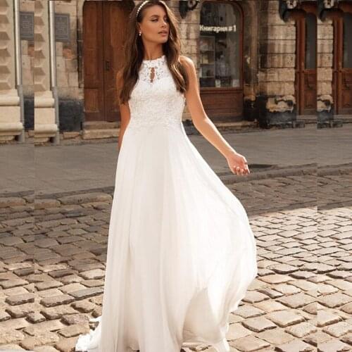 Halter A-Line Wedding Dress Boho Sleeveless Floor Length Bridal Gowns Lace Appliques Sweep Train Charming Vintage Rustic Civil