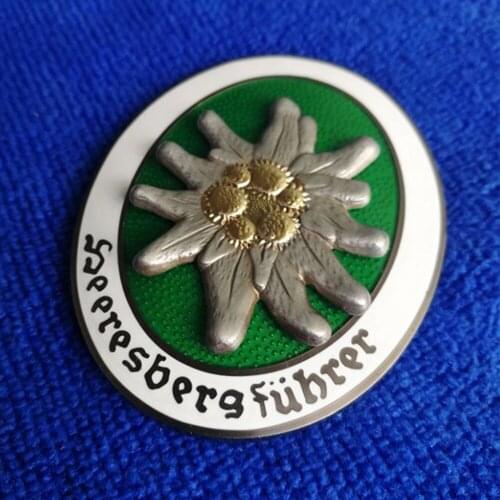 WWII GERMAN MOUNTAIN TROOPS CAVALRY EDELWEISS METAL BADGE PIN