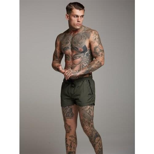 Muscleguys summer Solid Bodybuilding compression quick-drying shorts mens sweatpants gyms Fitness Men shorts slim fit clothes