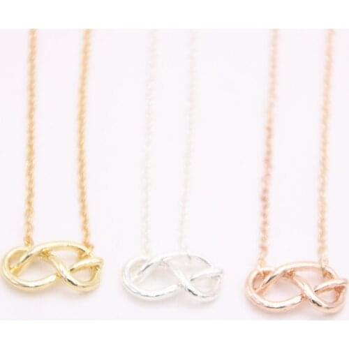 Cute grand cross knot Pendant necklace Cartoonish cross knot pendant necklace designed for women
