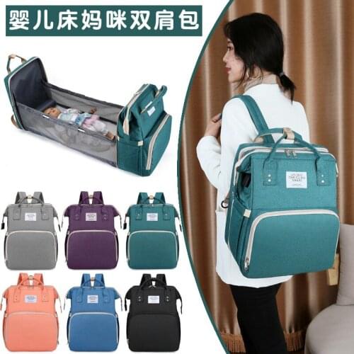 New model of 2021 portable folding bed mommy bag portable large capacity multifunctional mother and baby bag bed bag