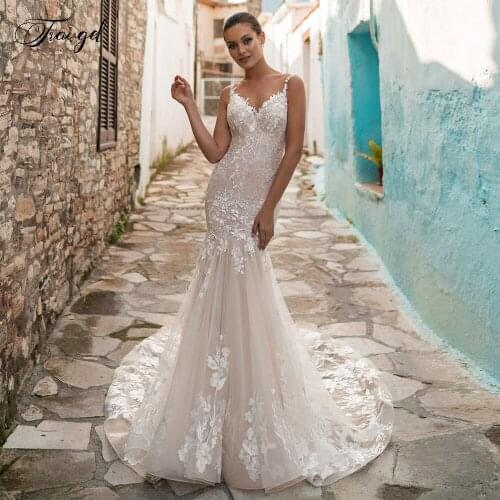 Traugel Mermaid Silhouette Wedding Dresses