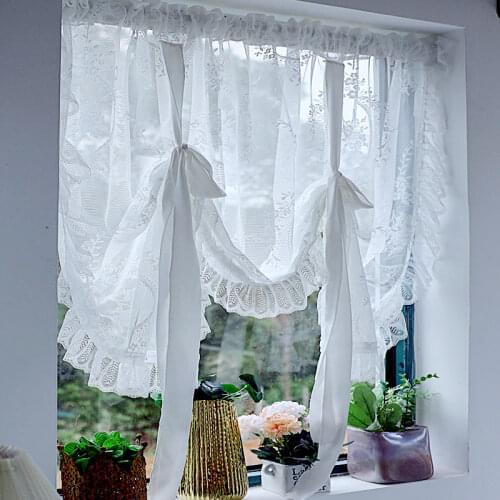 Brighten Sea Roman Blinds On The Windows