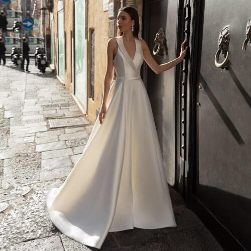 UZN Elegant Ivory A-Line Halter Satin Wedding Dress New Arrival Sleeveless Illusion Back Bridal Gown Plus Size Wedding