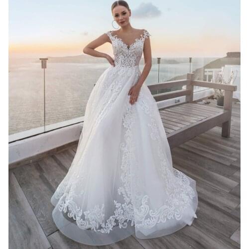 Sexy A Line Beach Wedding Dress 2021 Boho Appliques V Neck Vintage Bridal Gowns Buy China Direct Vestige De Noiva