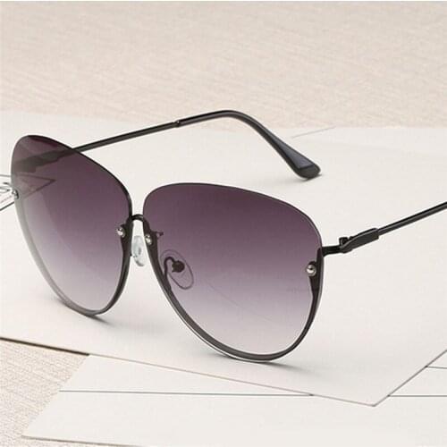 Rimless New Cat Eye Womens Sunglasses Trendy Transparent Sunglasses Ladies Transparent Big Metal Gold Rim Driving Goggles