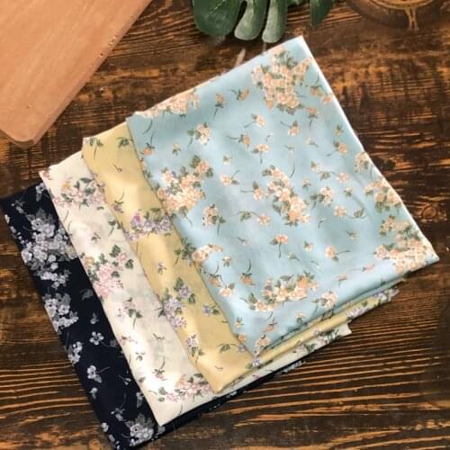 South Korean Silk Chiffon Fabrics Printed Thin Breathable Dress Cloth Yellow Blue And White Floral Pattern New Style/1 M