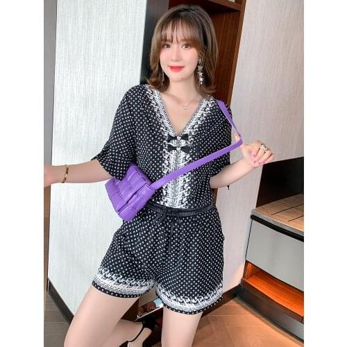 High quality Bowknot V - neck open fork horn sleeve belt wide-legged conjoined new shorts in summer