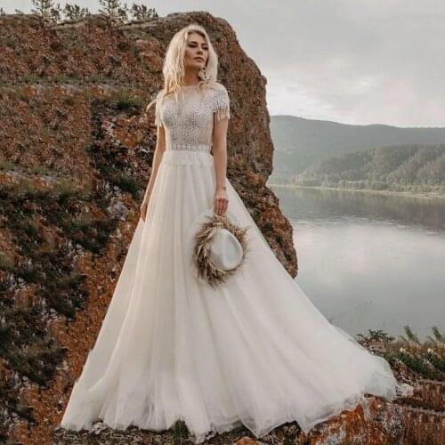 Boho Wedding Dresses Lace Appliques Bridal Gowns Short Cap Sleeves A-Line Bohemian Beach Bridal Gowns Vintage Robe De Mariee