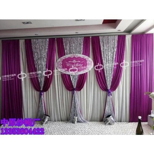 White Wedding backdrop with purple swags and silver sequin stage curtain decoration