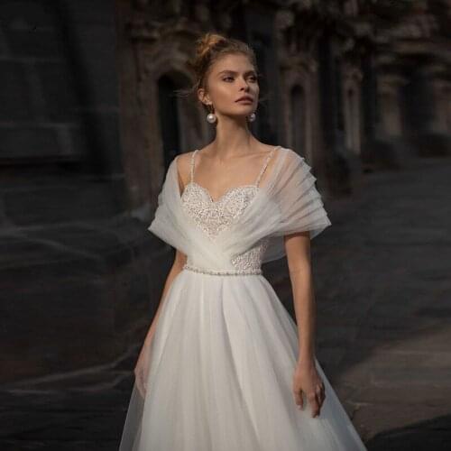 2021 A-line Wedding Dresses Off The Shoulder Sweetheart Neck Appliques Sequin Spaghetti Straps Beach Bridal Gowns Sweep Train