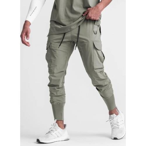 2021 New Mens Sports Casual Pants Fitness Overalls Trousers Spring And Autumn Thin Elastic Beam Foot Running Training Pants