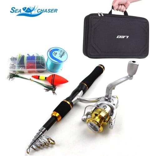 NEW 1.65M carbon rod Fishing Tackle Set Spinning Casting rod and Reels Hook Lures Portable bag lure fishing Free shipping