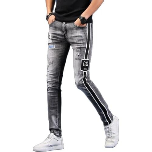 Wholesale 2020 Fashion Trendy hole embroidered jeans mens autumn brand loose Korean slim feet pants mens casual trousers